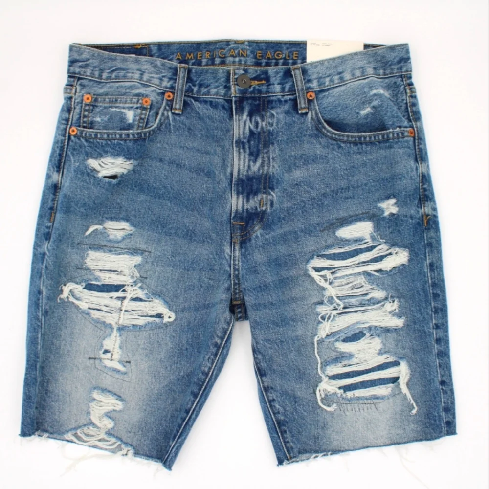 NWT American Eagle Men’s Cutoff Jean Shorts – Size 33 – Distressed Medium Blue - Picture 1 of 5